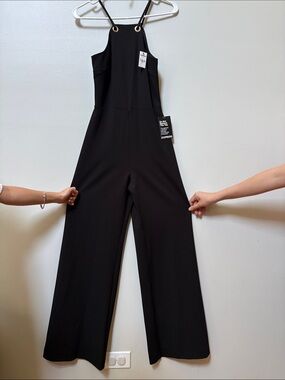 Express Black Wide-Leg Halter Jumpsuit with Grommet Straps